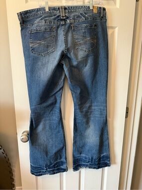 Maurices Dark Blue Flared Jeans